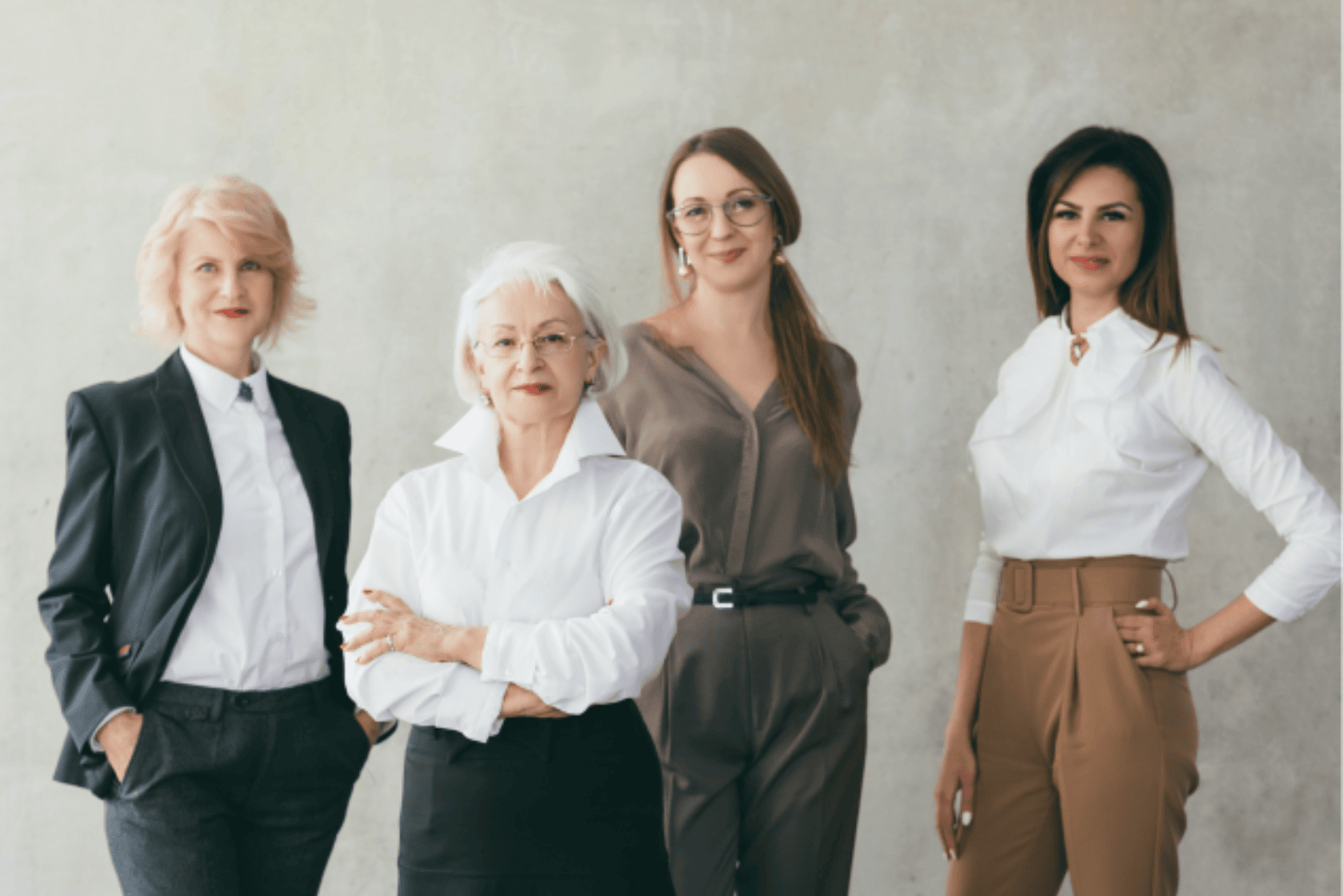 Fortune 500_compressed Four businesswomen standing next to each other